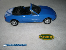 Mazda MX-5 NA Modellauto in Blau (DU-Blau), Massstab 1:18 von Kyosho – unbespielt, Sammlerobjekt.
