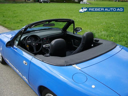 Mazda MX-5 NA Persenning Verdeckabdeckung Schwarz – Montage am Fahrzeug, Original Mazda Ersatzteil NA01R1960H66
