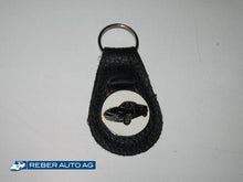 Mazda MX-5 NA Schlüsselanhänger aus Leder in Schwarz – mit MX-5 NA Abbildung, kompaktes Accessoire.
