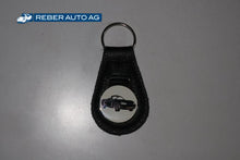 Mazda MX-5 NB Schlüsselanhänger aus Leder in Schwarz – mit MX-5 NB Abbildung, kompaktes Accessoire.
